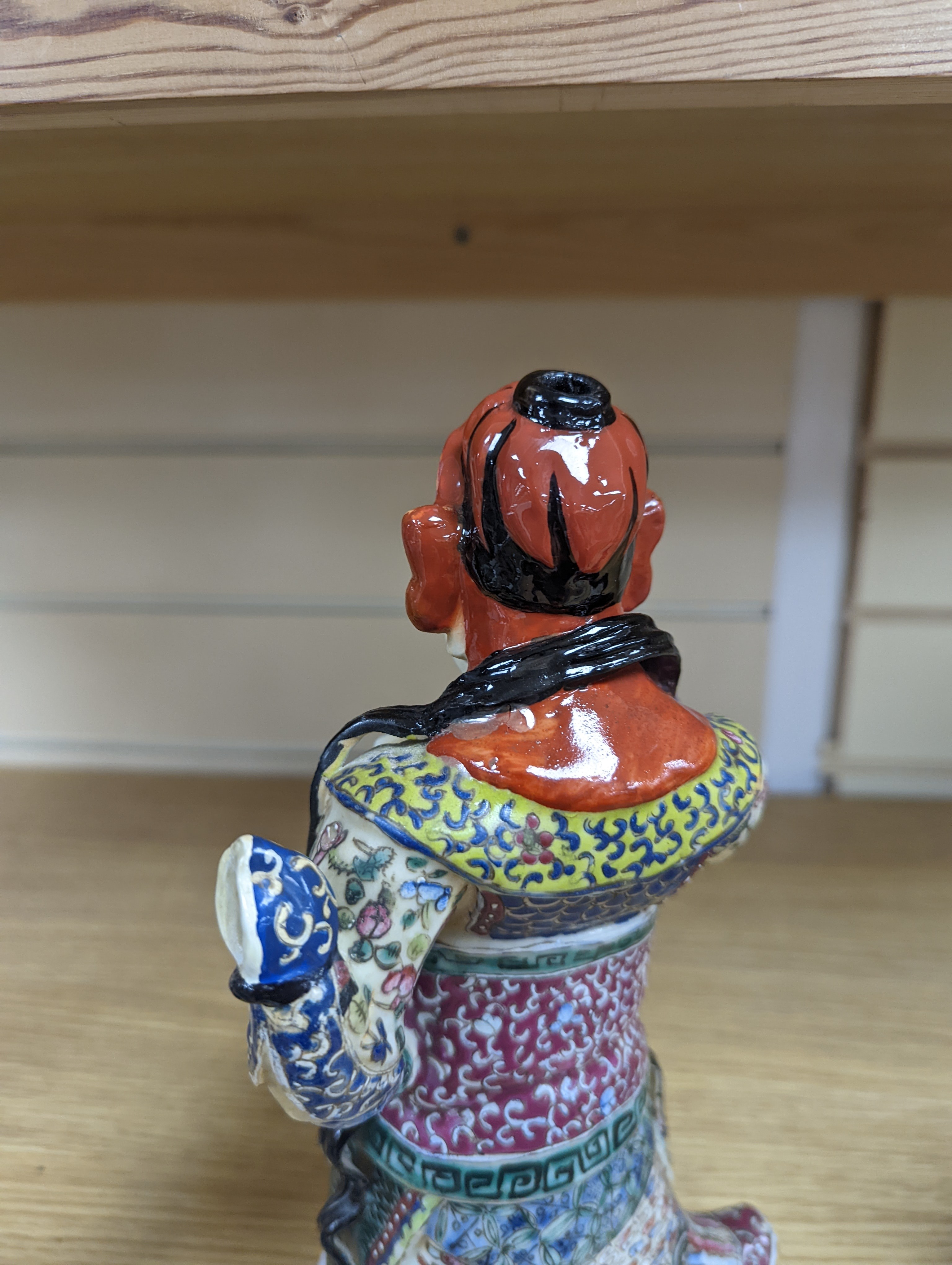 A Chinese enamelled porcelain figure of a General, Republic period, 26cm